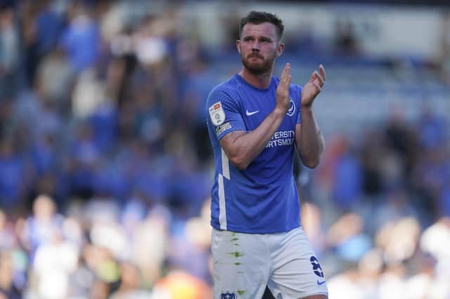 Portsmouth midfielder Ryan Tunnicliffe applauds the fans during the EFL Sky Bet League 1 match between Portsmouth and Crewe Alexandra at Fratton Park, Portsmouth, England on 14 August 2021.