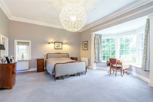 The property boasts four bedrooms in total, with the master featuring an attractive fireplace, a large bay window, walk-in wardrobe and an en-suite shower room with a walk-in cubicle.