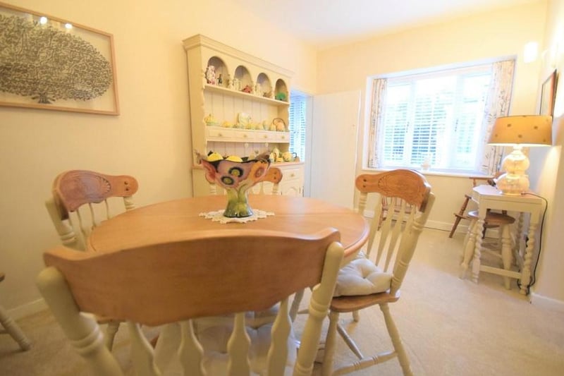 A good sized dining room that enjoys traditional features such as two display niches with exposed beam work, double glazed window to the side gardens, radiator, and access leads back into the lounge and kitchen.