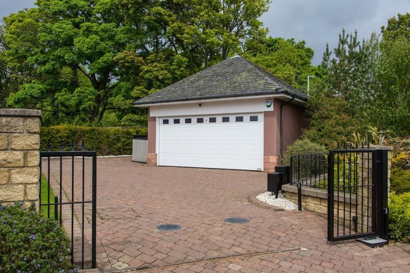 Gated entrance and double garage.