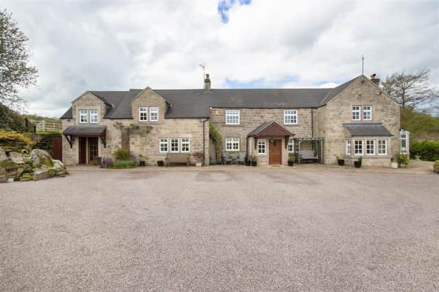 Yew Tree Lodge boasts six bedrooms, five bathrooms and five reception rooms.