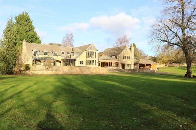 This seven bedroom property is surrounded by approximately two acres of grounds, including a paddock, and boasts its own newly refurbished swimming pool, and wonderful garden views which extend to the countryside beyond. Price: £1,850,000.