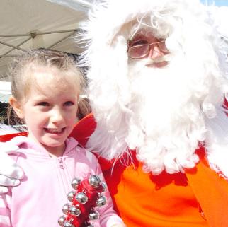 Faith Glossop, aged five meets Santa Claus in 2009.