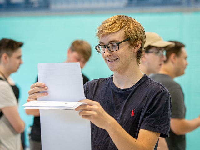 Oliver Hawkins looking at his results at UTC College in Portsmouth. Picture: Habibur Rahman