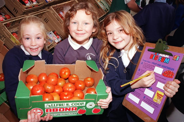 Lakeside Primary school pupils, from left, Josephine Bowerman, aged eight, Beth Hulme and Hannah Walker, both aged seven and a half, are pictured at the Asda store, Doncaster,  taking part in the Asda Big Sum event.