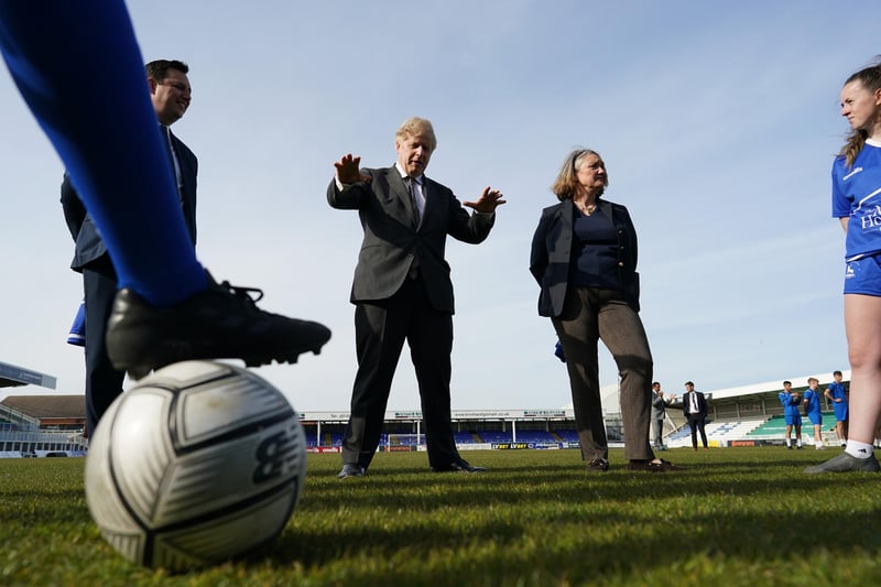 Jill Mortimer, Conservative party candidate for Hartlepool and Prime Minister Boris Johnson, speaking with team members of the Hartlepool United Ladies Team during a visit to the Hartlepool United Football Club, in Hartlepool, ahead of the May 6 by-election.