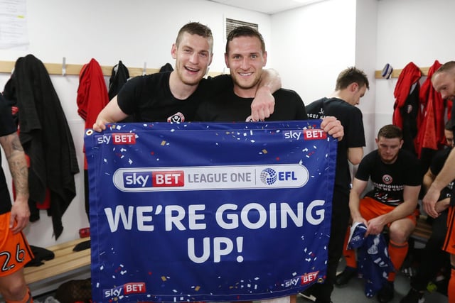 Sheffield United's Billy Sharp and Paul Coutts celebrate promotion during the League One match at the Sixfields Stadium, Northampton. Pic David Klein/Sportimage