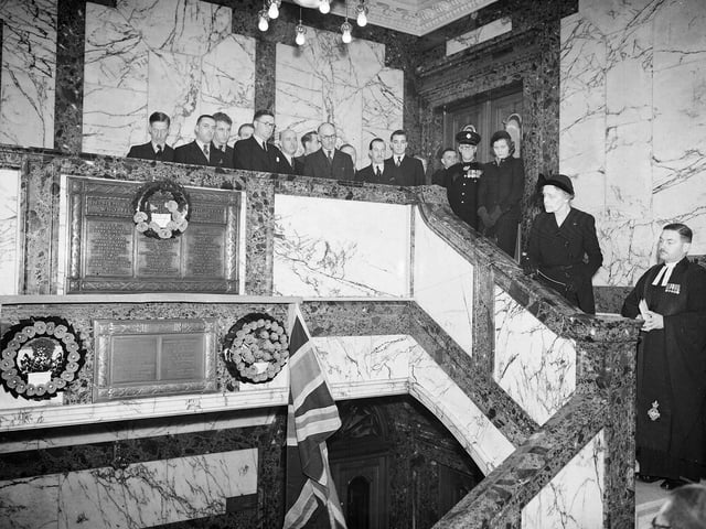 A memorial plaque to those who died in the two World Wars in unveiled on the marble staircase of The Scotsman offices by Lady Findlay in February 1951.