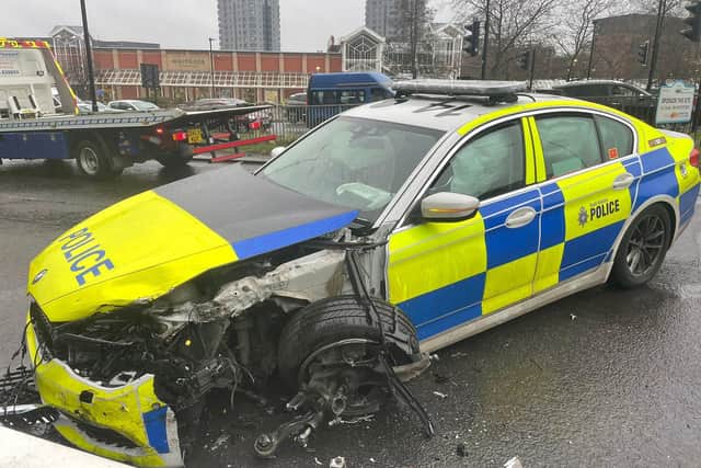 The aftermath of a serious crash on St Mary's Gate in Sheffield city centre, near the roundabout opposite Waitrose, which left two police officers in hospital. Two men were arrested on suspicion of dangerous driving