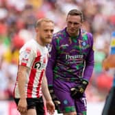 Wycombe Wanderers goalkeeper David Stockdale has emerged as a potential addition for Sheffield Wednesday.