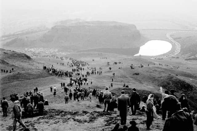 A view of crowds coming down from the summit of Arthur's Seat in Edinburgh after the May Day sunrise service in 1966.