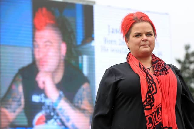 Claire Mercer led a protest against so called 'smart motorways in London today. This file picture shows her next to a giant mobile screen outside South Yorkshire Police headquarters calling on them to prosecute Highways England over the death of her husband, Jason, whose picture is in the background. Picture: Chris Etchells
