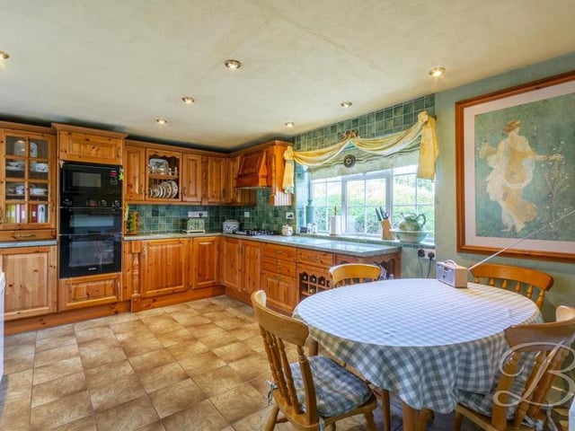 The kitchen is described by estate agents Buckley Brown as "fantastic" - and you can see why! It comes complete with traditional cabinets, units and work surfaces.