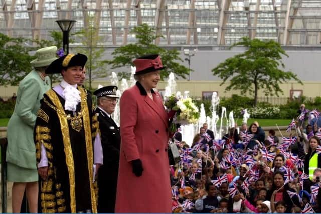 Queen Elizabeth II meeting the crowds in Sheffield's Peace Gardens.
