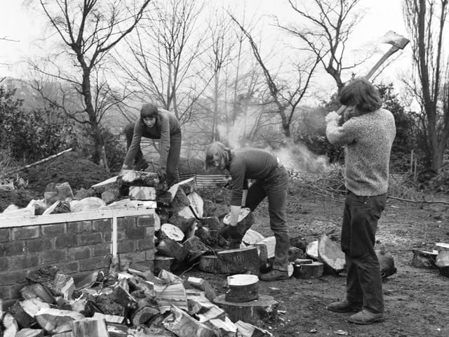 Edinburgh University students and helpers at Inverleith Park chopping logs for old people's firewood during the power cuts