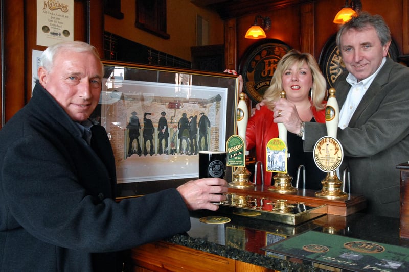 Artist Bob Olley with pub owners Alison and Jess McConell as they pulled the first pint of a new brew called Westoe Netty in 2006.
