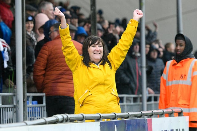 This Pompey fan shows her delight at Ronan Curtis' goal at Bristol Rovers.