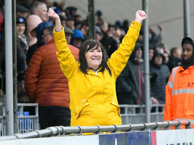 This Pompey fan shows her delight at Ronan Curtis' goal at Bristol Rovers.