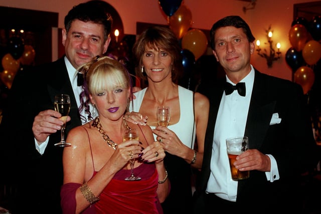 Michael Wosscow, Jilly Wosscow, Janet Flint and Peter Flint at the 1998 St Luke's Hospice Ball at Baldwins Omega