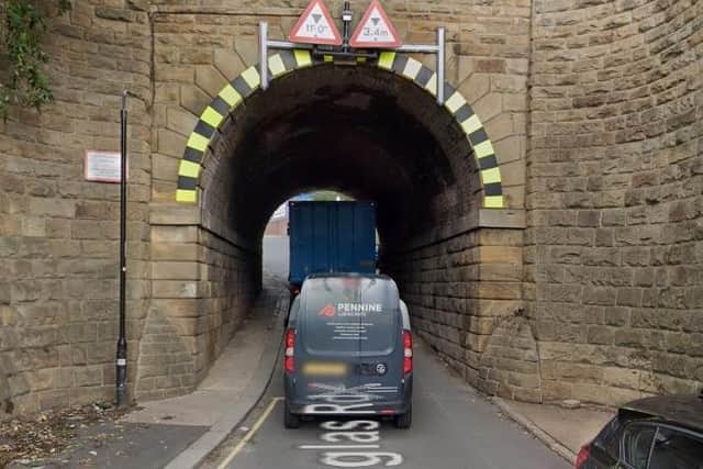 The current access road features a narrow single-vehicle tunnel. But a report states it is necessary to ’secure access across a bridge owned by Network Rail’.
