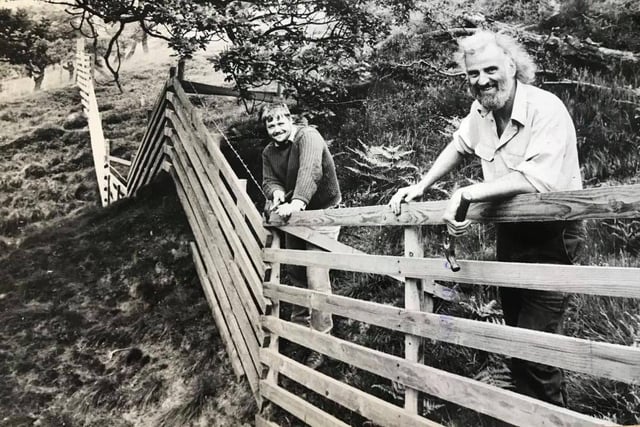 National Park wardens Bob James, right , and Simon Booth pictured with some of their handiwork in the Peak District in June 1986
