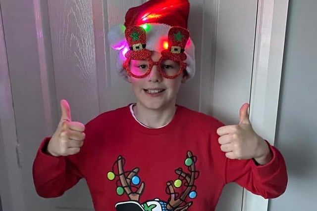 Theo, age 10, in his festive gear for Christmas Jumper Day.