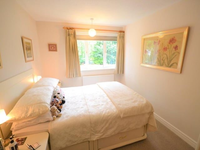 Bedroom 1 - A well presented double bedroom enjoying a pleasant outlook from a front facing UPVC double glazed window, having a superb range of stylish fitted wardrobes, offering a combination of hanging rails and storage space, matching fitted drawers and bedside drawers, various power sockets and a central heating radiator.