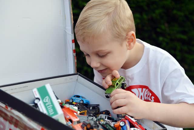 Four-year-old Lewis Copley has been overwhelmed by the Hot Wheels toys he has received