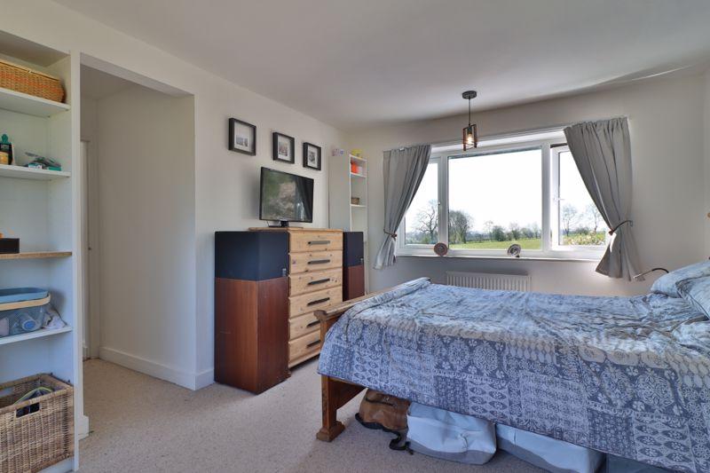 Excellent double bedroom with dual aspect overlooking rear and front garden.