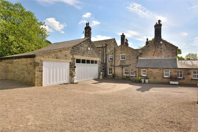 Outside, the property is fully enclosed and boasts a private courtyard, three garages, a large gated driveway, and an alarmed outbuilding that can be used as a workshop or stables.