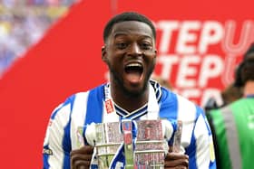Sheffield Wednesday's Dominic Iorfa celebrates with the trophy and promotion to the Sky Bet Championship following victory in the Sky Bet League One play-off final at Wembley Stadium, London. Picture date: Monday May 29, 2023. (Nick Potts/PA Wire)