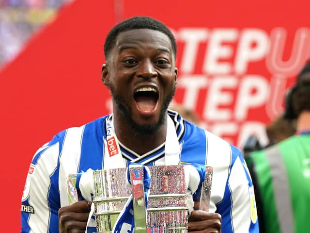 Sheffield Wednesday's Dominic Iorfa celebrates with the trophy and promotion to the Sky Bet Championship following victory in the Sky Bet League One play-off final at Wembley Stadium, London. Picture date: Monday May 29, 2023. (Nick Potts/PA Wire)