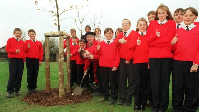 Students from Rossington High School watched Mayor of Doncaster Councillor Dorothy Layton planted a tree in 1996