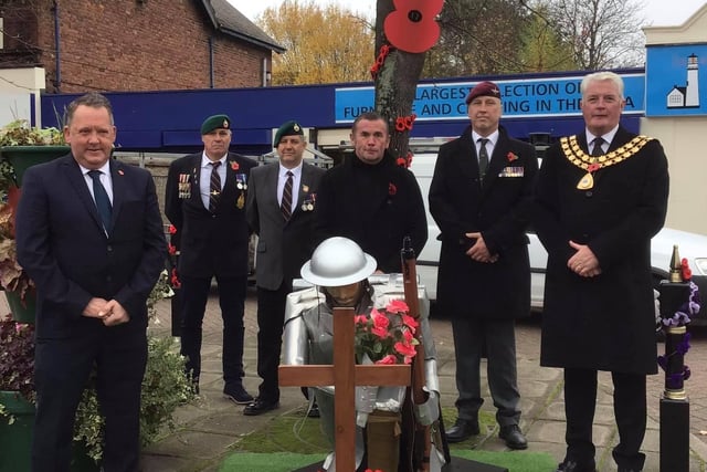 Councillors Arnie Hankin and Andy Gascoyne, along with other dignitaries, at the service at the Selston Memorial.