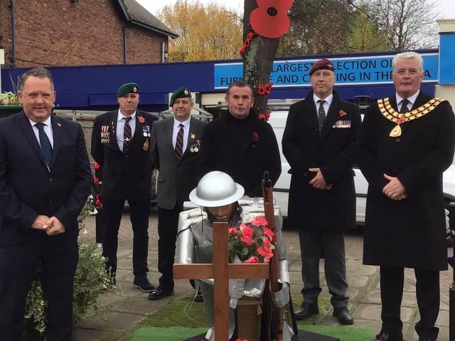Councillors Arnie Hankin and Andy Gascoyne, along with other dignitaries, at the service at the Selston Memorial.