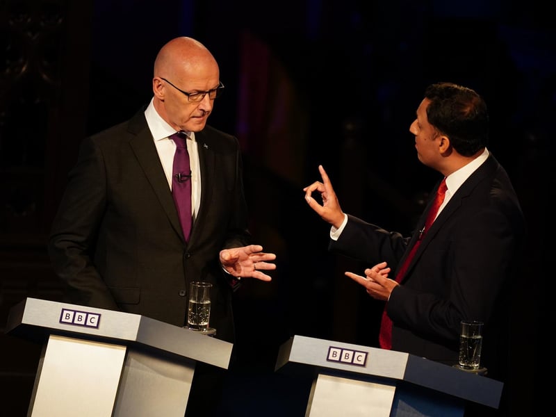 SNP leader John Swinney and Scottish Labour leader Anas Sarwar took part in a BBC Debate Night election special on Tuesday, with leaders of the five main Scottish parties answering questions in Glasgow. Mr Swinney claimed both the Tories and Labour would continue austerity. But Mr Sarwar told him: "Read my lips. No austerity under Labour."  
