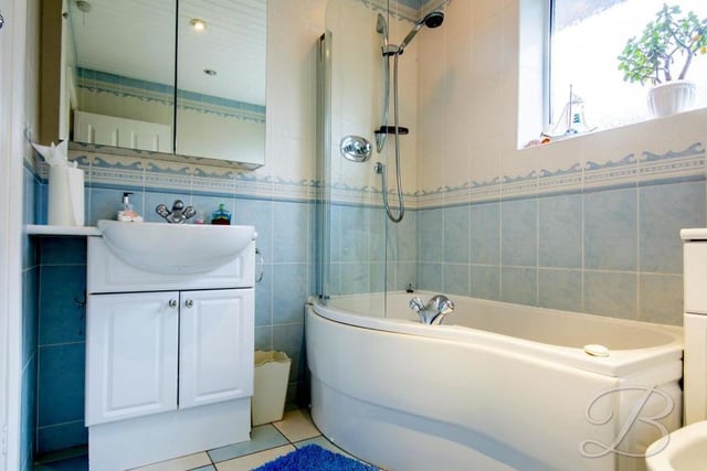 The main bathroom in the bungalow is a bonny asset. As well as bath with screen and overhead shower, it has a low-flush WC, wash hand basin and bidet.