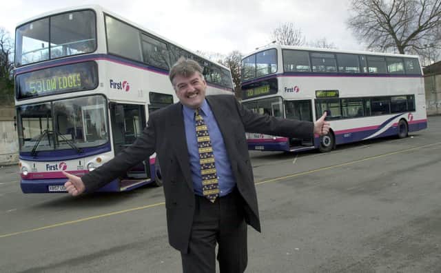 Mainline MD Gary Nolan with two of the new double decker buses brought in to service this week