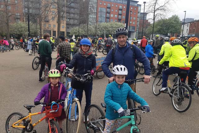 Tim and Keriana Fish with their children, Georgina, nine, and Maryanne, five, at the Space for Cycling big ride through Sheffield