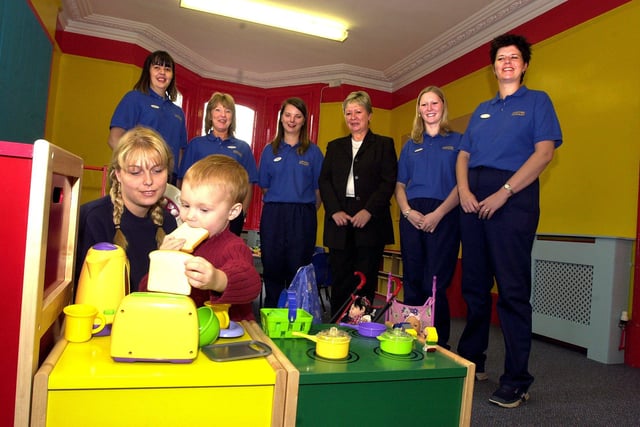 Ahead of the opening of the Carousel Day Nursery (UK) Ltd, Mexborough in 2003. Our picture shows Louise Grayson and her son Joseph, aged two and a half, at the nursery. Looking on are  owner Linda Willoughby (fourth left), manager Michelle Stead (right) and staff members, from left, Gemma Smith, Jackie Burkinshaw, Donna Seddons and Helen Jackson.
