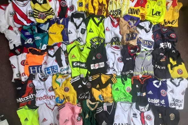Sheffield United fan David Beeden's collection of away shirts