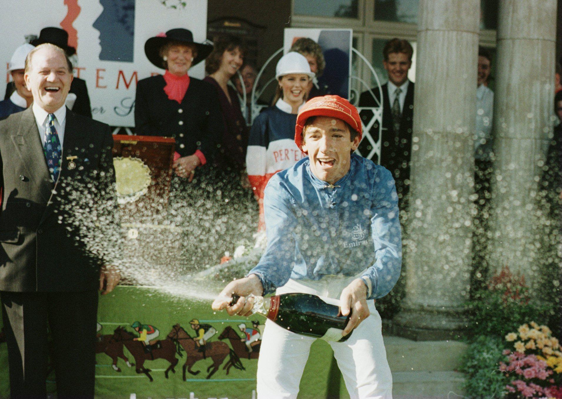 Frankie Dettori celebrates victory on Classic Cliche in the 1995 race. 
