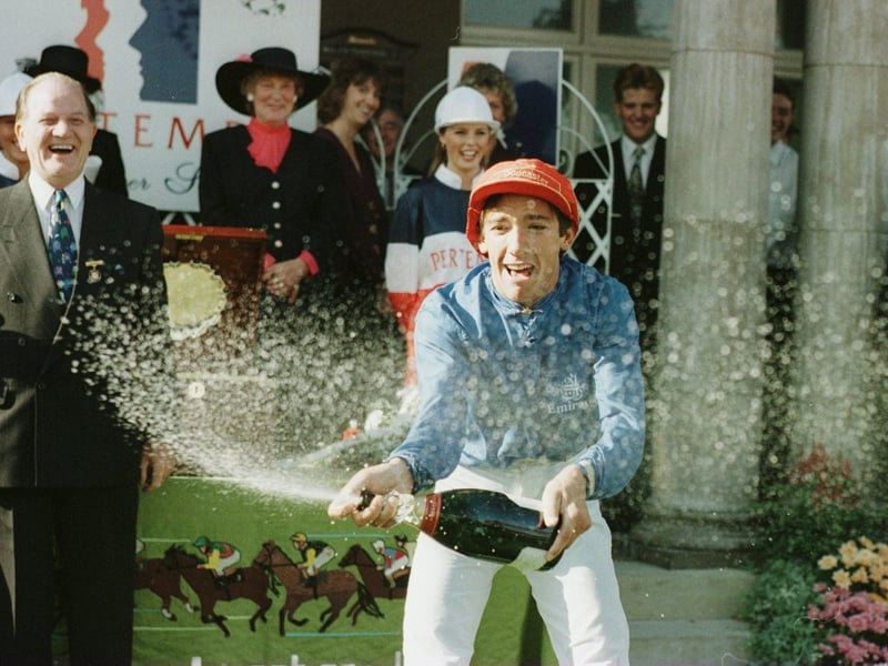 Frankie Dettori celebrates victory on Classic Cliche in the 1995 race. 