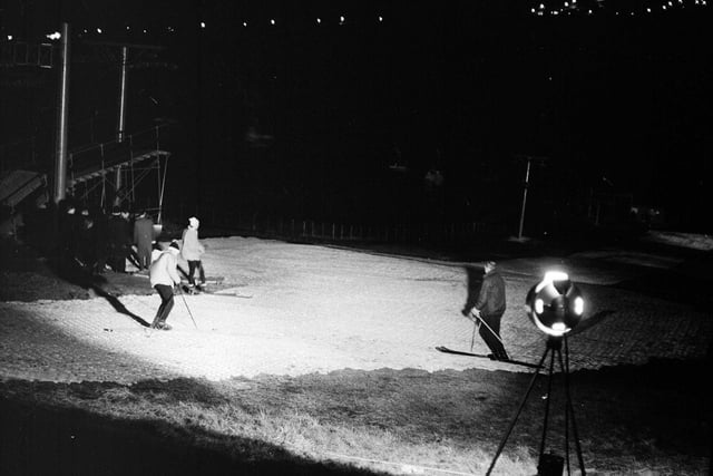 Skiers try out Hillend's new gas floodlighting in October 1966.