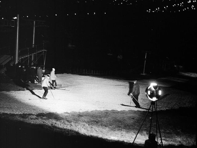 Skiers try out Hillend's new gas floodlighting in October 1966.