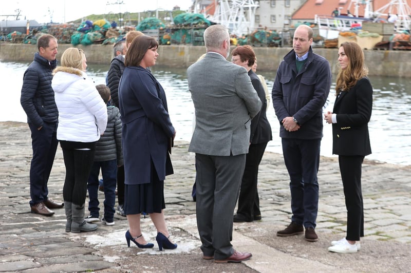 The royal couple pictured talking to families from the fishing community in Fife.
