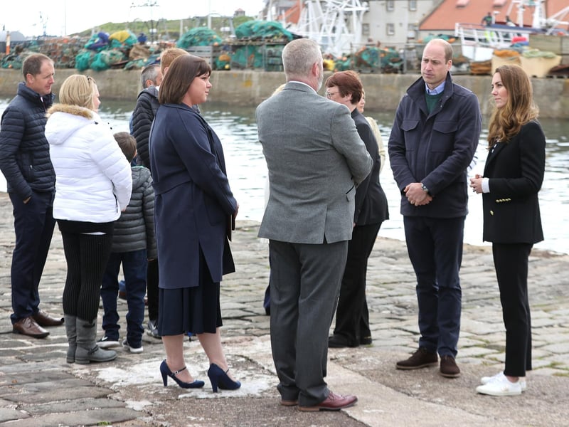 The royal couple pictured talking to families from the fishing community in Fife.
