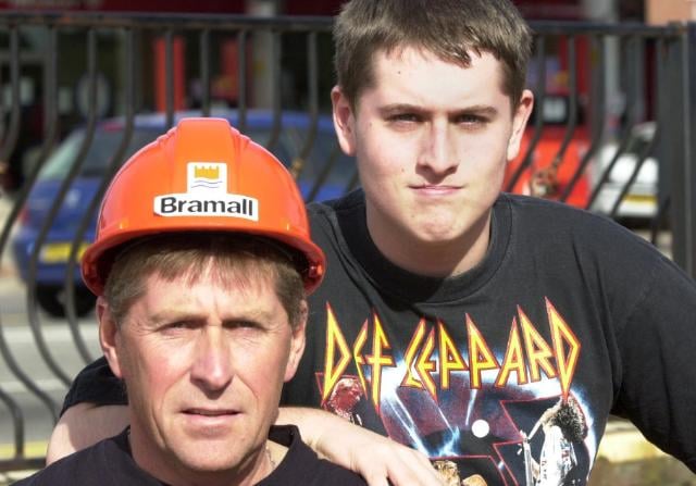 Carpenter Glyn Wilkinson with his son in 2003.