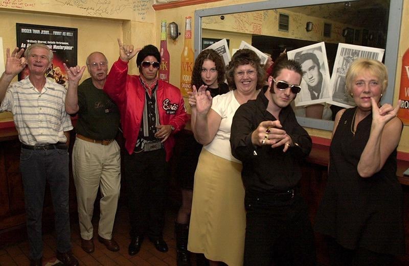 Pictured at Under the Boardwalk, Snig Hill, Sheffield, where an Elvis tribute night was held.  Seen are fans and lookalikes at the club.  Left to right are: Steve Cutforth, Brian Froggatt, John Burrows, Becky Selwood, Brenda Cutforth, Ed Kelly, and Carole Froggatt, August 2002