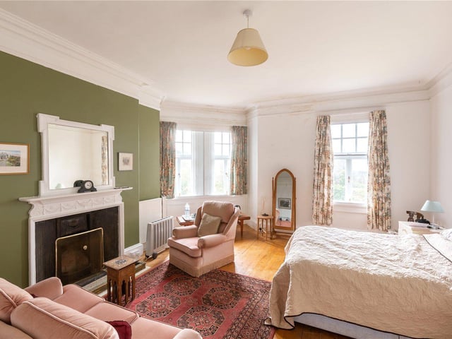 One of the eleven bedrooms in the house.